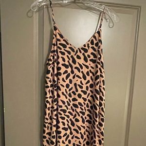 Kathleen Barnes The Drop spaghetti strap dress.